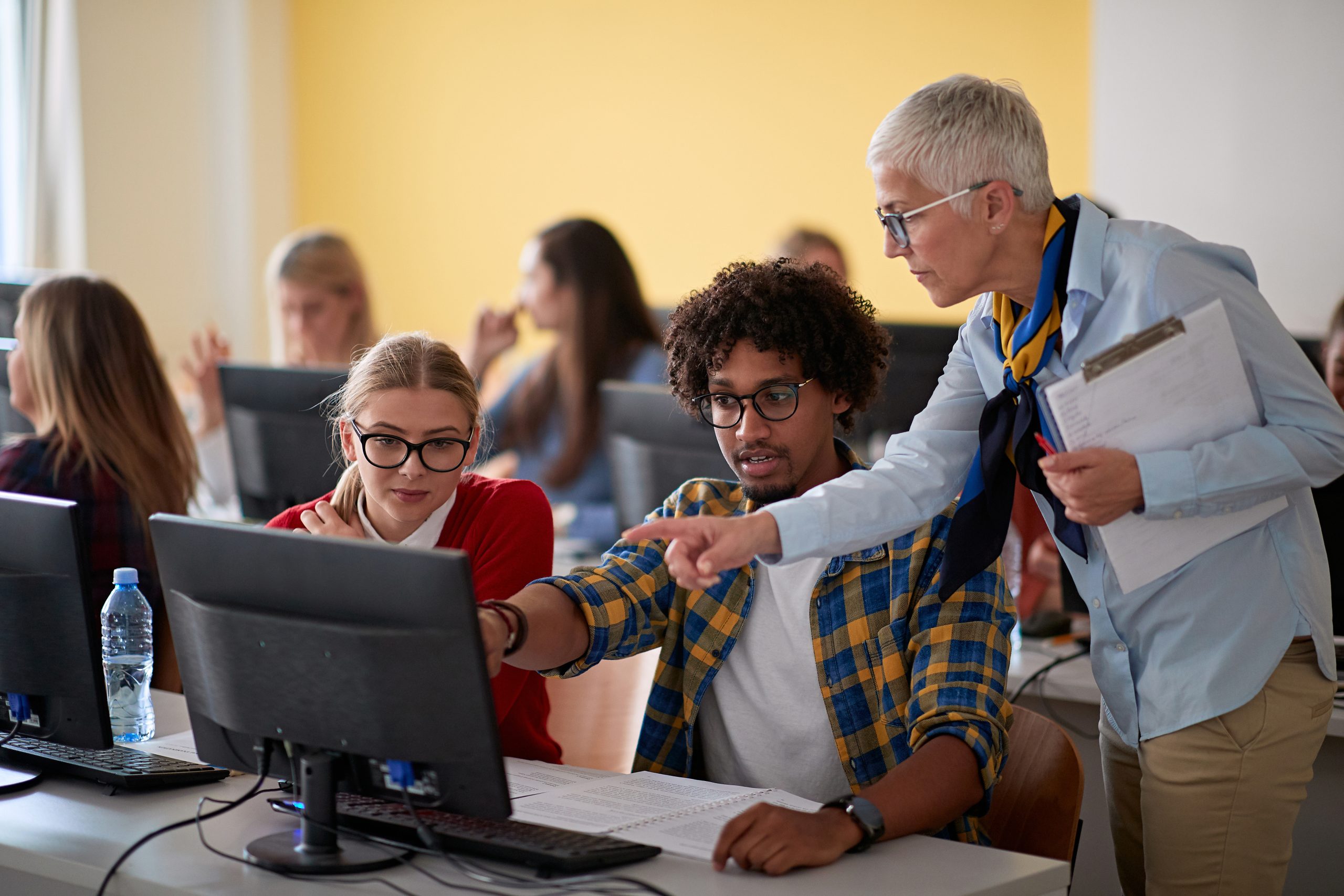 Students in a classroom with a professor